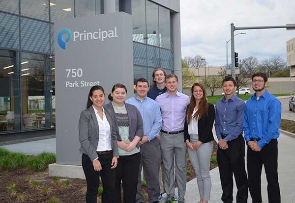 The 2017 Enactus team poses in front of Principal Financial in Downtown Des Moines