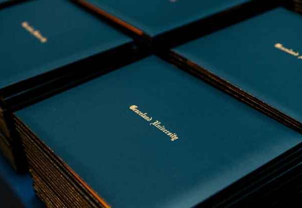 stacks of Graceland University diplomas