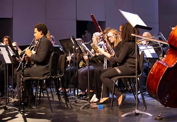 Band students on stage in concert