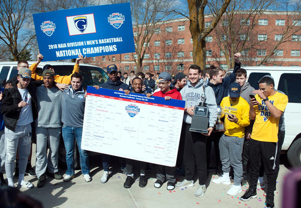 The men's basketball team returns home after winning the 2018 NAIA National Championship