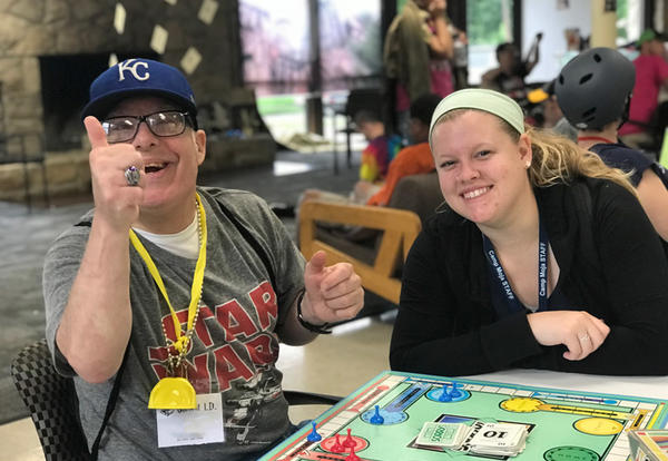 GU Admissions Counselor Sarah Peck with male camp goer.