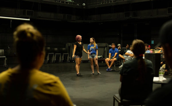 students act in theatre class