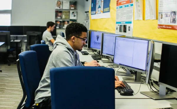 student works at computer