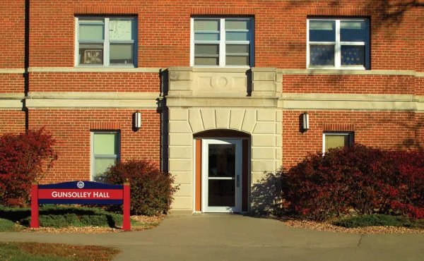 exterior brick Gunsolley men's residence hall entrance