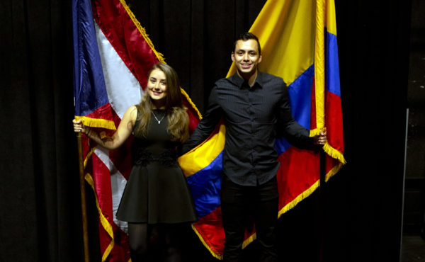 international students holding flags