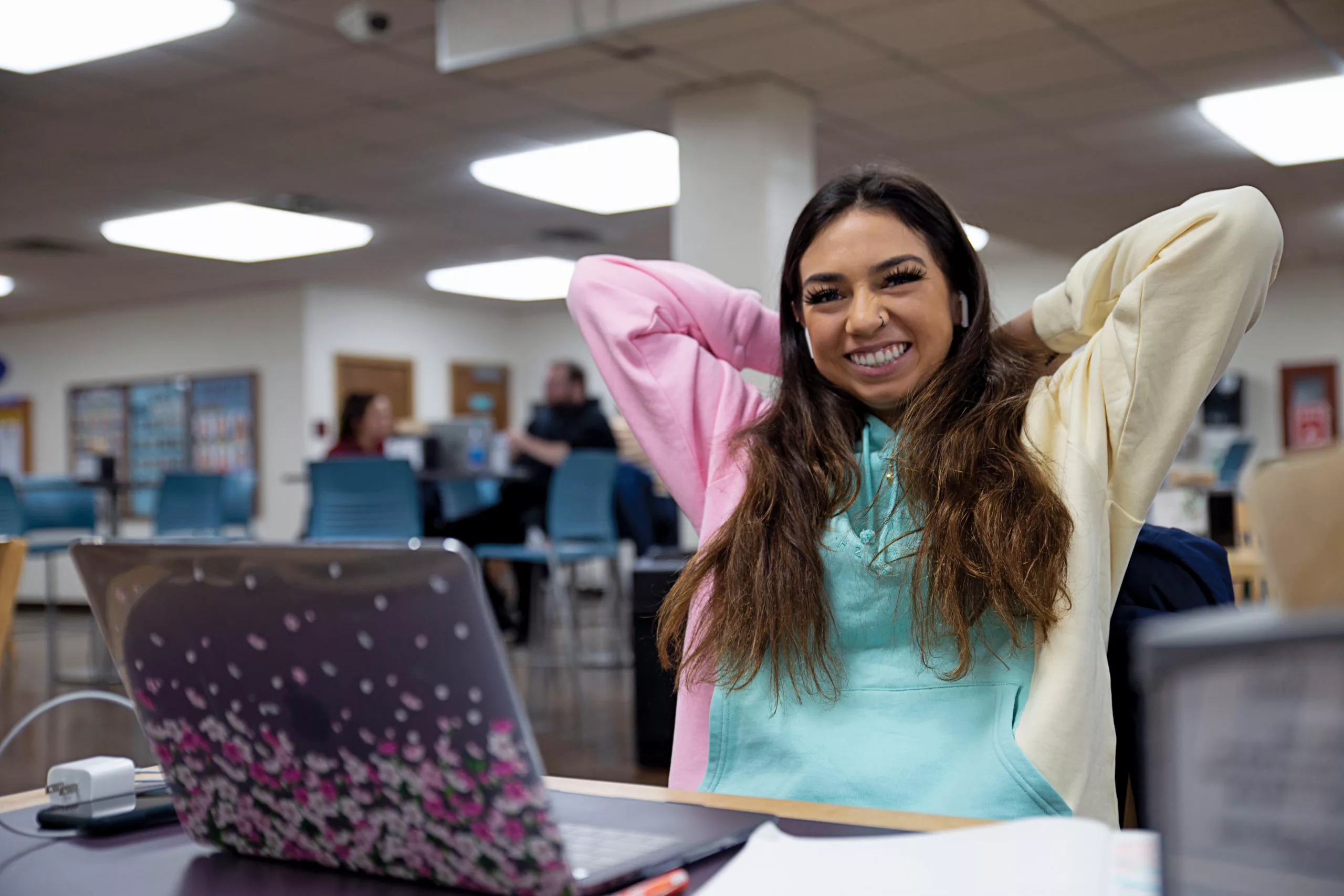 smiling student studying in library