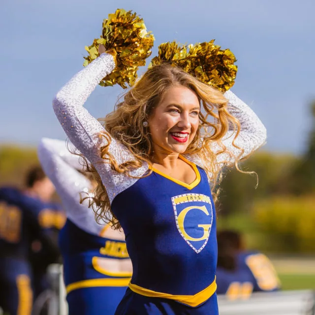 smiling Gadet dancer at game