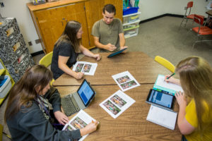 overhead view of education students working together during class