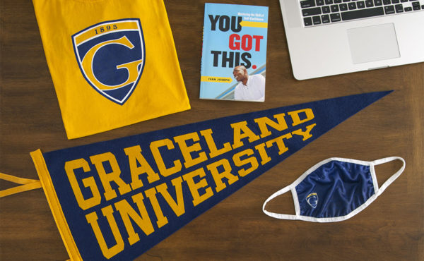 Graceland flag, pennant, book and mask