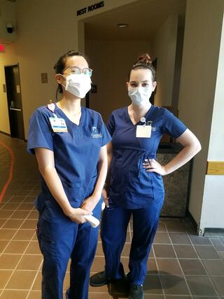 Graceland nursing students posing in scrubs on duty at Independence City Hall