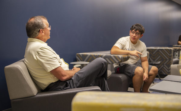 Dean of Students Talks with Student