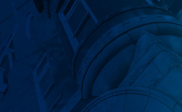 Faded image of administration building.