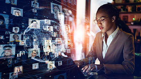 Woman working at a computer.